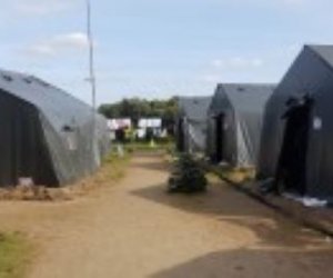 СОГГ Литвы: мигранты переселены из палаточного городка в Швендурбе 